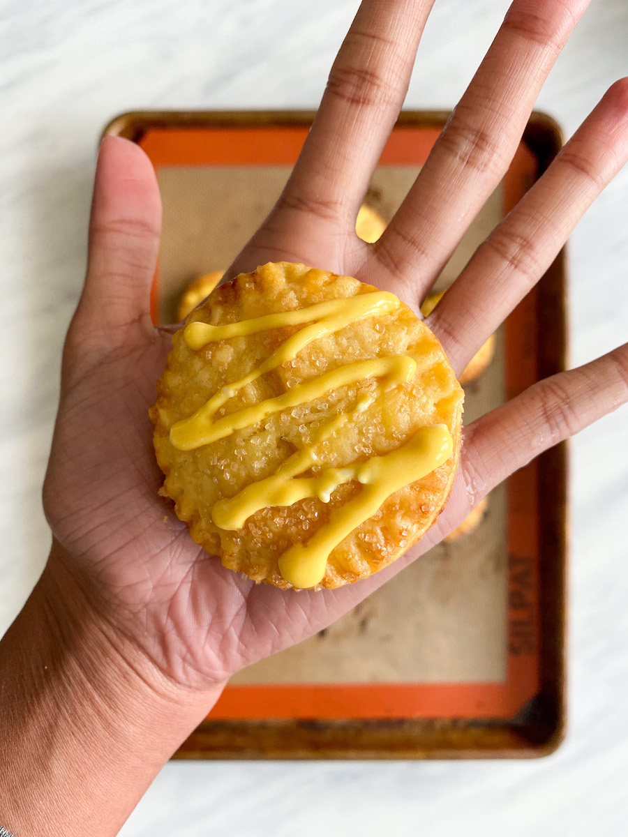 Mango cheesecake hand pies with mango drizzle